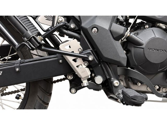 PROTECTOR PISTON FRENO TRASERO SAHARA 300