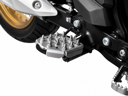 EXTENSOR POSA PIES TRANSALP 750