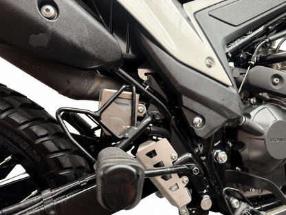 PROTECTOR RECIPIENTE FRENO TRASERO TORNADO 300