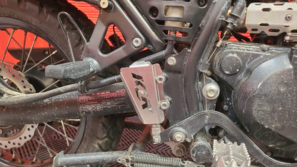 KLR650PPFT - PROTECTOR PISTON FRENO TRASERO