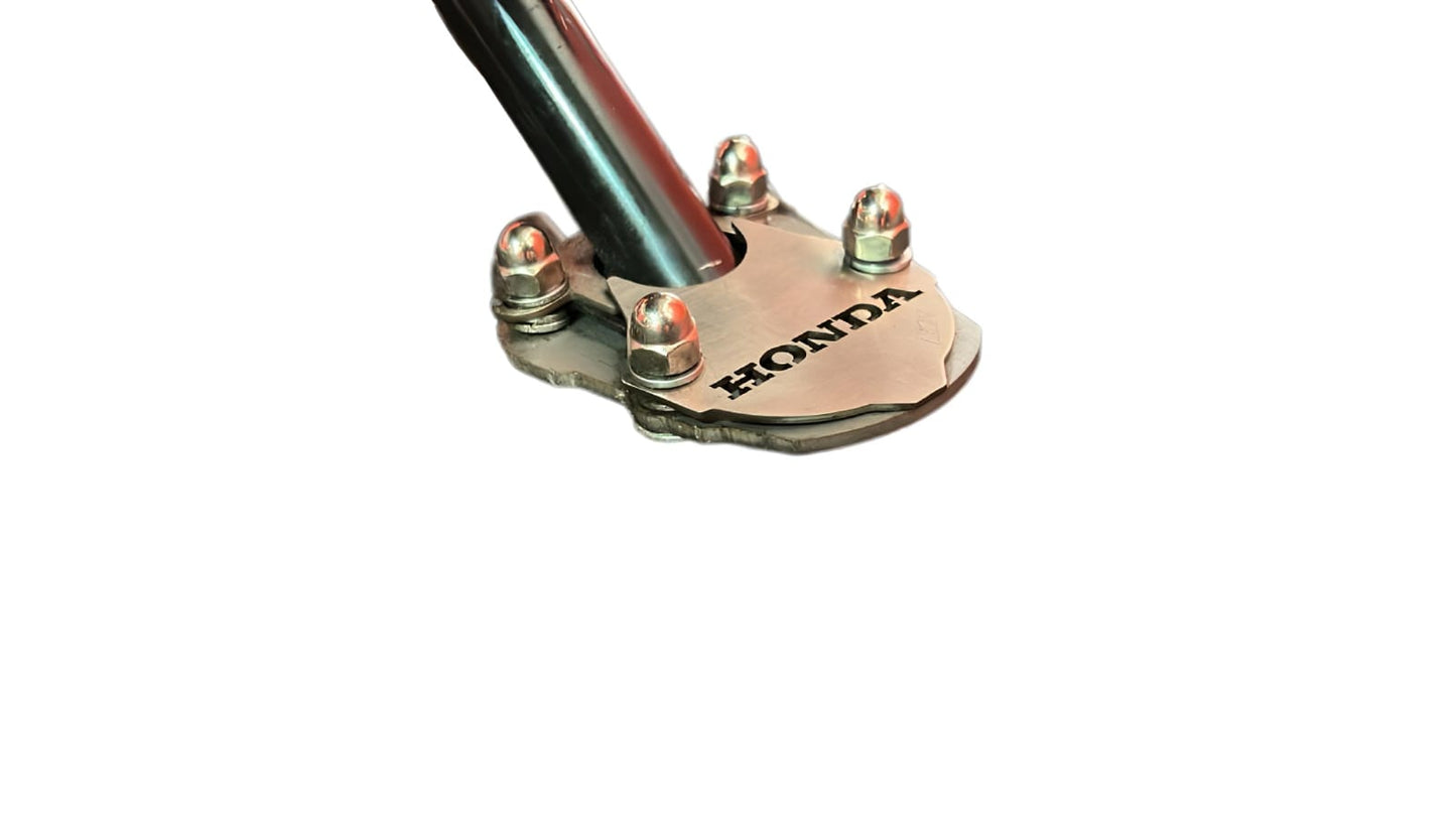 XRE3BP - BASE PATA LATERAL HONDA XL 750 TRANSALP