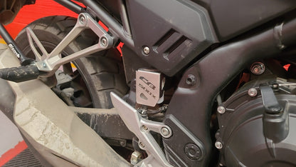 CB500XPRFT22 - PROTECTOR RECIPIENTE FRENO TRASERO HONDA NX 500