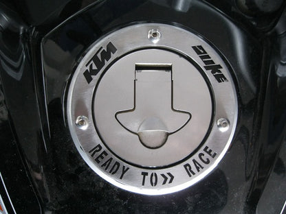 KTM200PTT - PROTECTOR TAPA DE TANQUE
