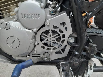 XTZ250PPS - PROTECTOR PIÑON SALIDA